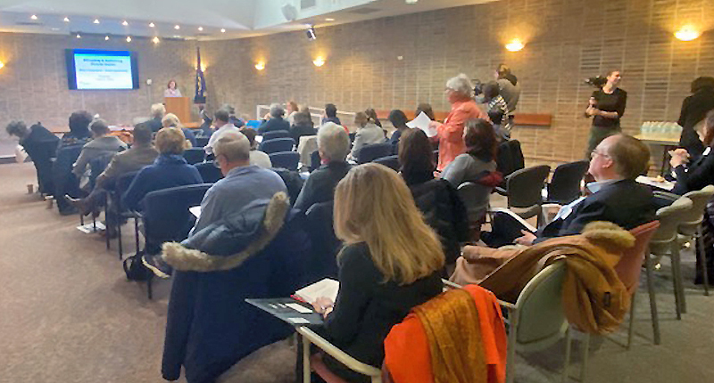 IMG_0160_cropped_800x430 Audience members at a LeadershipConnect training looking at a presenter speaking at a podium.
